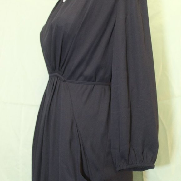 Flattering Black Baby Doll Dress - Picture 4 of 14